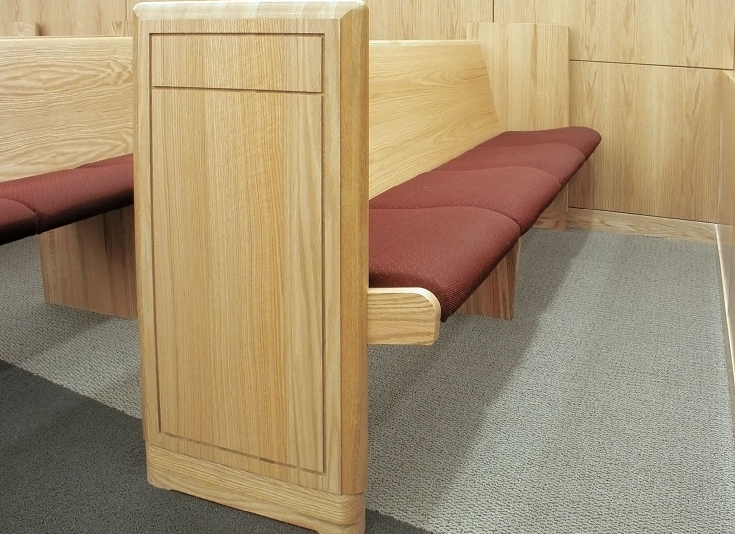 Upholstered Definity Seat and Wood Back Benches inside Brighton Police Court - Brighton, CO